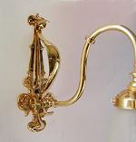 Hammered Art Nouveau bracket w amber shade 